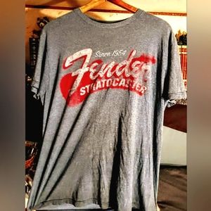Adorned  T shirt with a vintage-style faded Fender Stratocaster logo.